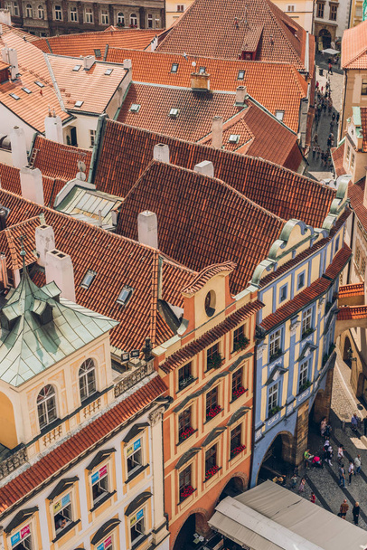 PRAGUE, CZECH REPUBLIC - JULY 23, 2018: aerial view of rooftops and beautiful architecture in prague old town - Photo, Image