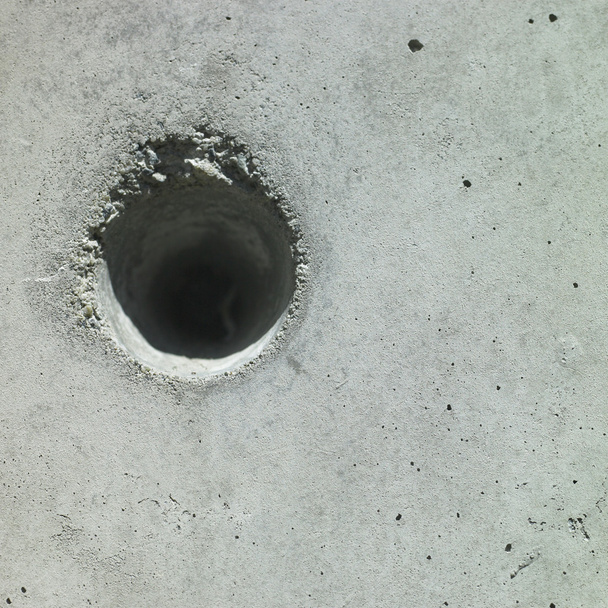 Hole in beton - Foto, afbeelding