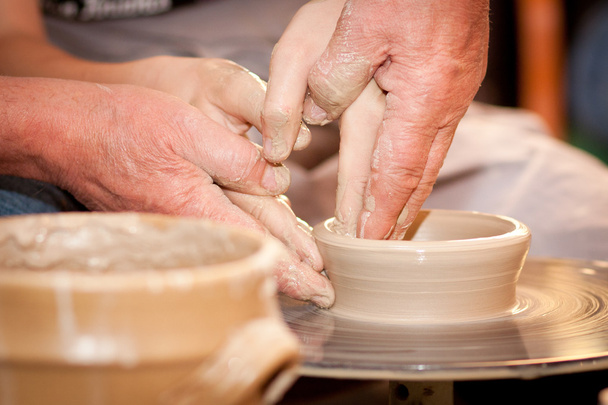 Potter on the potters wheel - Photo, Image