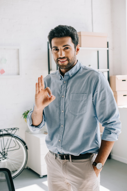 handsome cheerful architect showing okay gesture in office - Photo, image