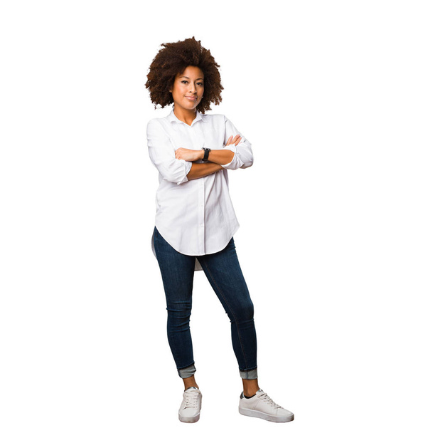 young black woman crossing arms full body - Фото, зображення