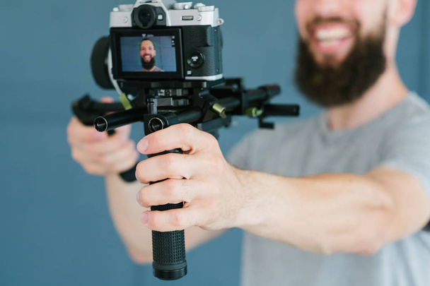 video creation social media man shoot camera - Foto, Imagen