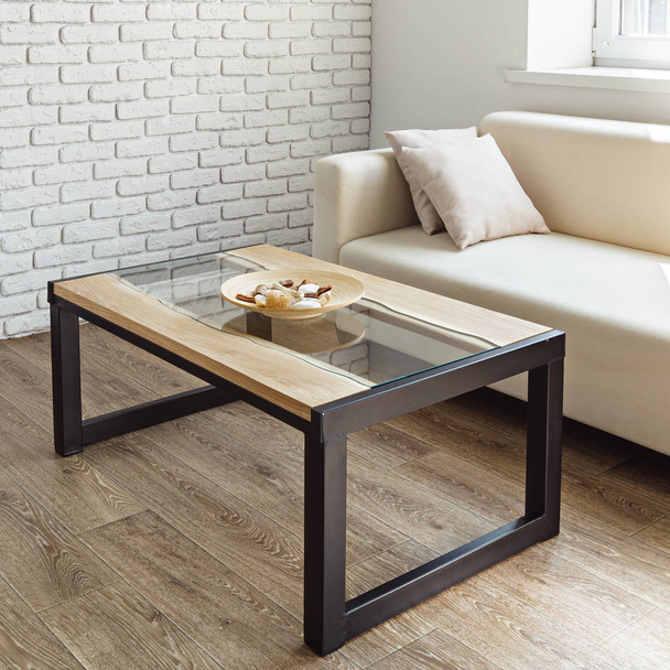 modern wooden table in stylish loft interior - Foto, imagen