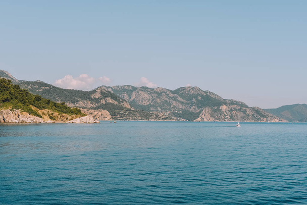 MARMARIS, TURKEY - CIRCA JUNE 2018: view of Mediterranean sea and little islands and hills from the coast of Marmaris Turkish Riviera. - Фото, изображение