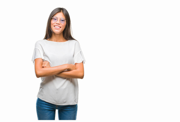 Young asian woman wearing glasses over isolated background happy face smiling with crossed arms looking at the camera. Positive person. - Photo, image