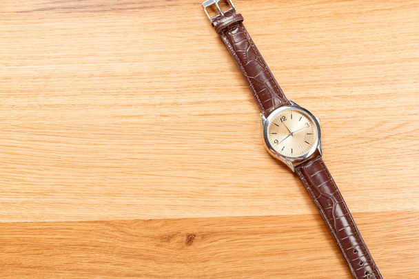 close up of vitage watch on the wooden table - Photo, Image