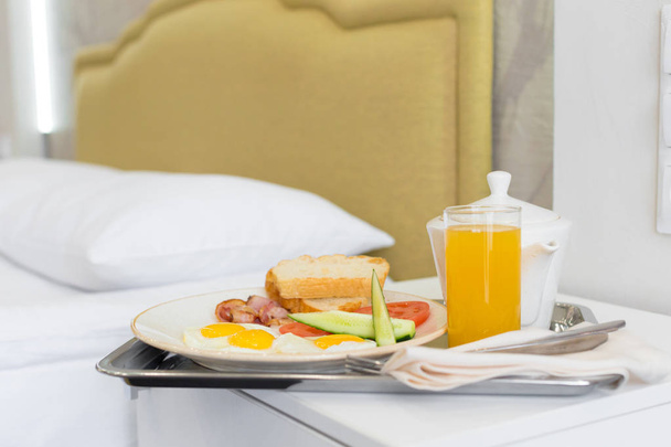 Breakfast in bed in hotel room - Valokuva, kuva