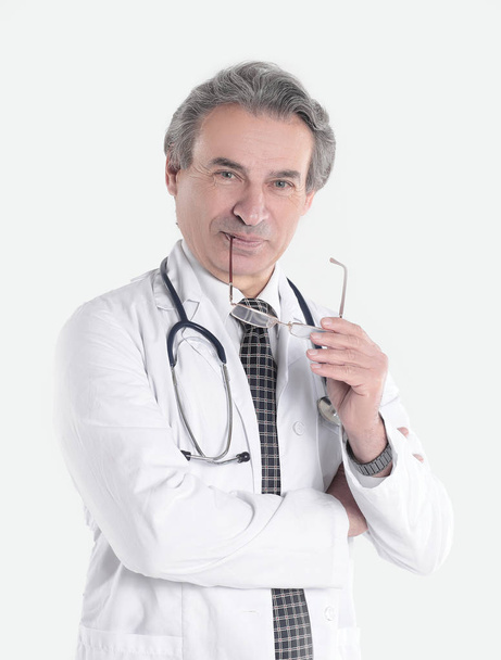 portrait of a benevolent physician therapist.isolated on white background - Zdjęcie, obraz