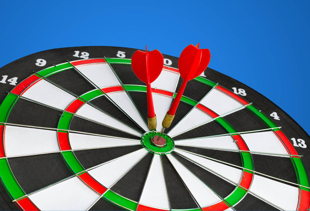 darts arrows in target center on bright background - Fotografie, Obrázek