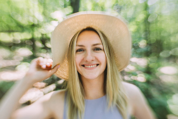 beautiful young woman in hat outdoor - Photo, Image