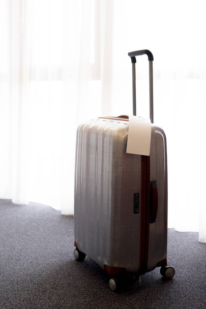 Stylish luggage bag in modern hotel room - Zdjęcie, obraz
