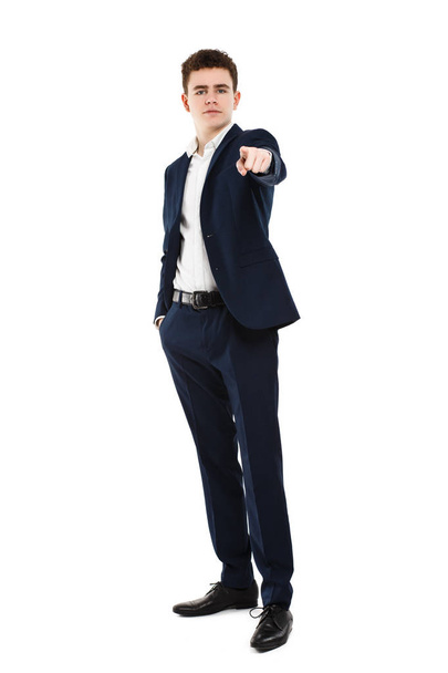 Boy in suit poiting with finger isolated on white background - Φωτογραφία, εικόνα