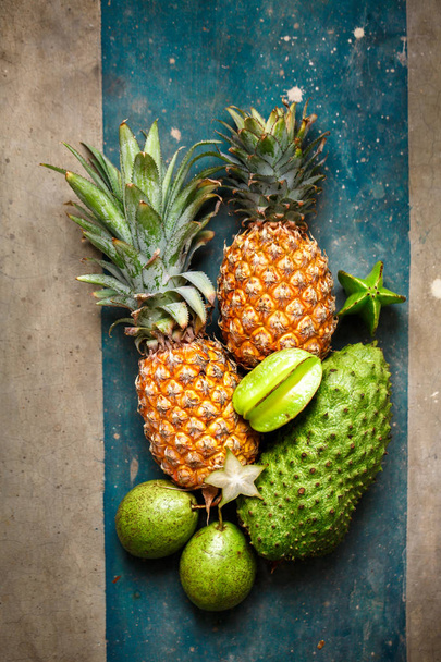 Pineapples and green fruits - Foto, Imagen