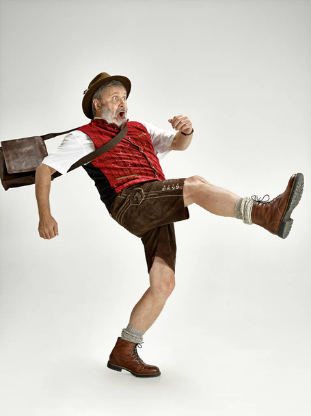 Portrait of Oktoberfest man, wearing a traditional Bavarian clothes - Фото, зображення