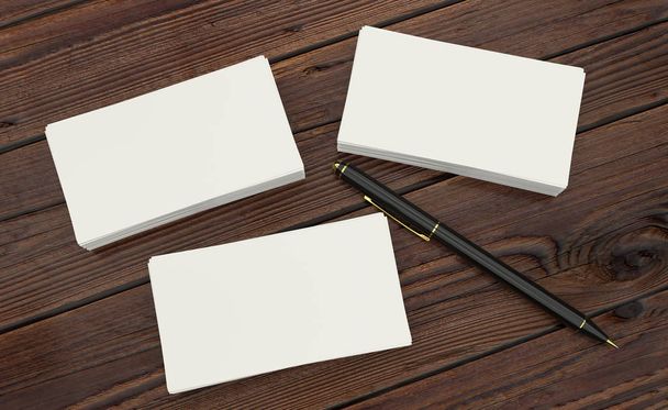 Presentación en 3D de la tarjeta de visita blanca en blanco de la identificación corporativa con la pluma negra en la mesa de madera
 - Foto, Imagen