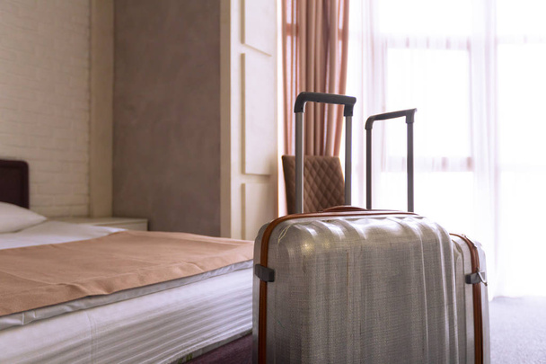 Two suitcases in a modern hotel room - Fotó, kép