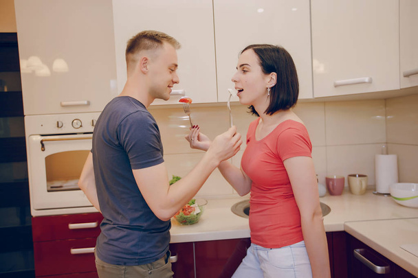 couple in a kitchen - Fotó, kép