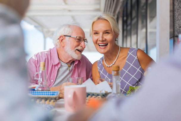 Delighted aged people having great time together - Foto, immagini