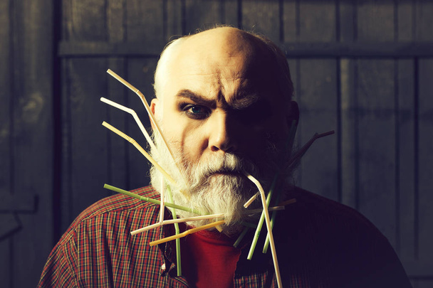 old man with drinking straws in beard - Fotoğraf, Görsel