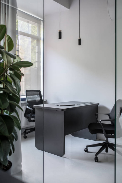 Stylish office in loft style with gray walls - Фото, зображення