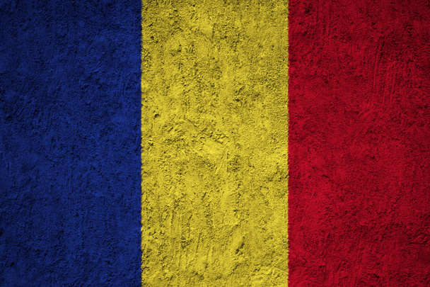 Romania flag on the grunge concrete wall - Photo, Image