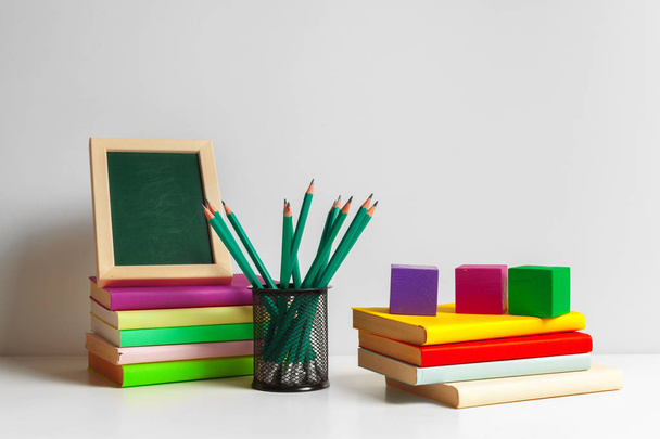 Green pencils in a holder,school supplies - Fotoğraf, Görsel