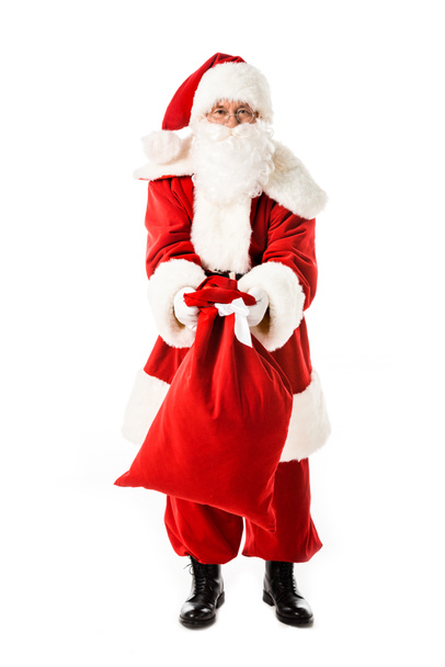 santa claus showing sack at camera isolated on white - Foto, immagini