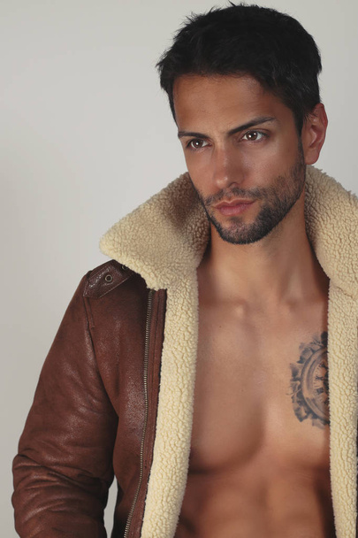 Sexy man model wearing open jacket - Photo, Image
