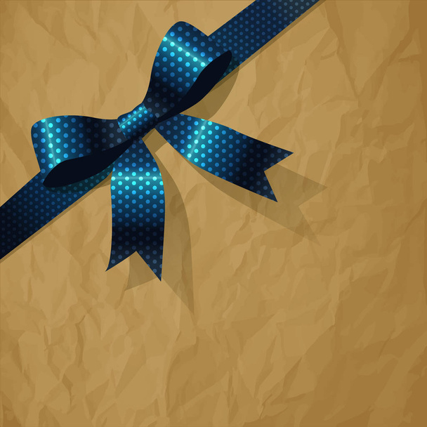 Dark blue polka dot ribbon on a crumpled paper brown background. - Vector, Image