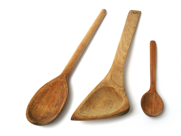 Geschirr, Kochgeschirr aus Holz, Kochlöffel, Küchenspatel, Kochutensilien. Headstock Image, nostalgishop - Foto, Bild