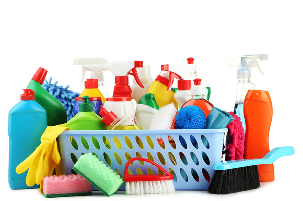 Bottles with detergent and cleaning tools on white background - Foto, Imagen