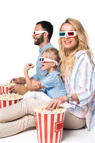 side view of family eating popcorn isolated on white - Foto, Imagem
