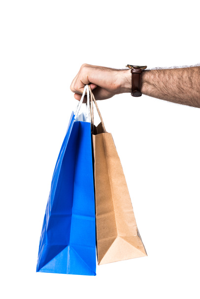 cropped view man holding shopping bags isolated on white - Fotografie, Obrázek