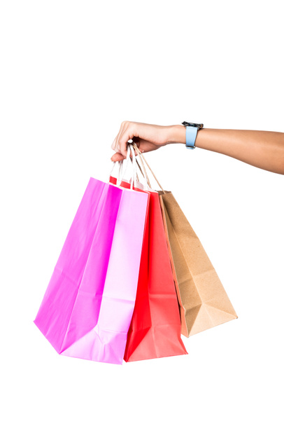 woman holding shopping bags isolated on white - Foto, imagen