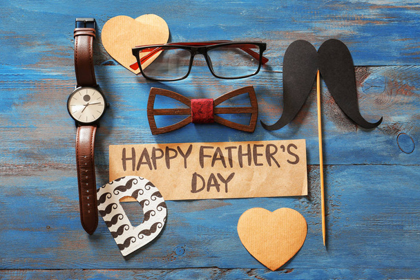Composition with male accessories and paper with text HAPPY FATHER'S DAY on wooden background - Φωτογραφία, εικόνα