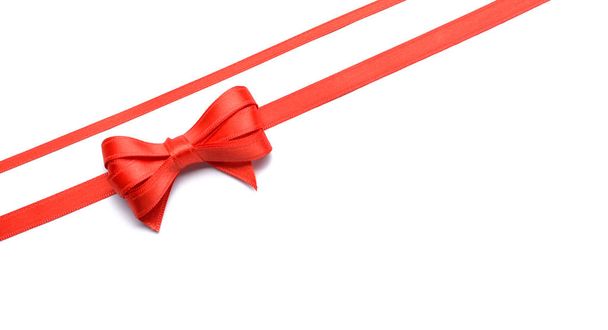 Red ribbons with bow on white background - Photo, Image