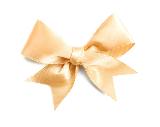 Beautiful bow made from golden ribbon on white background - Photo, Image