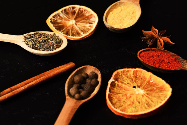 Composition of condiment, close up. Set of spices, grey background. - Foto, afbeelding