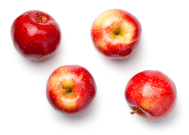 Красные яблоки изолированы на белом фоне. Праздничное яблоко. Вид сверху
 - Фото, изображение