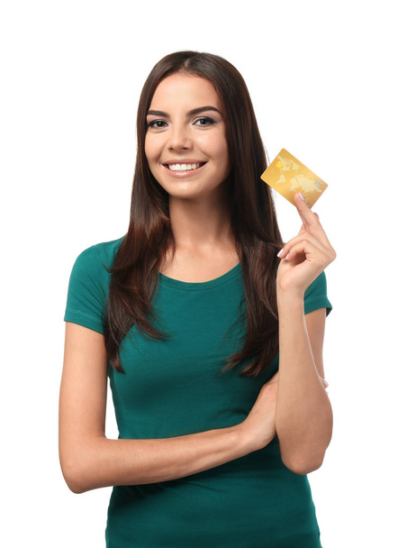 Young woman with credit card on white background. Online shopping - Foto, Imagen
