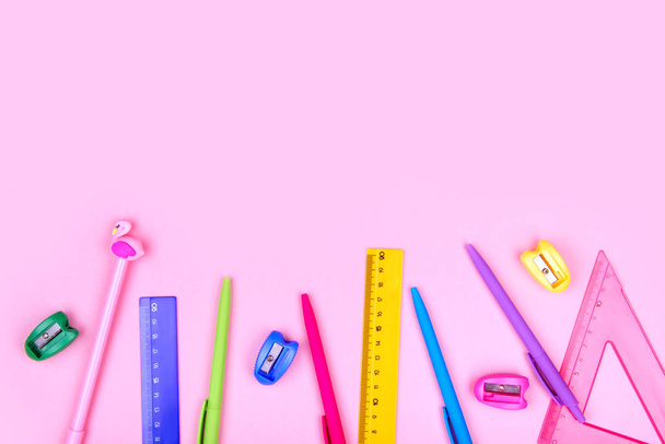 School stationery on a pink background. Back to school creative illustration, template. - Foto, immagini