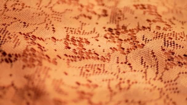 Tekstura tkanina tkaniny pomarańczowy jako tło - Materiał filmowy, wideo