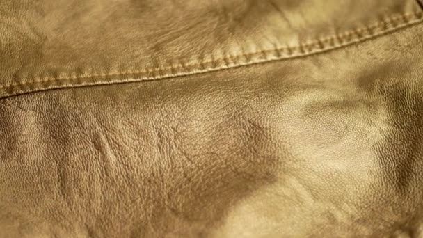 Golden yellow synthetic leather jacket - Footage, Video