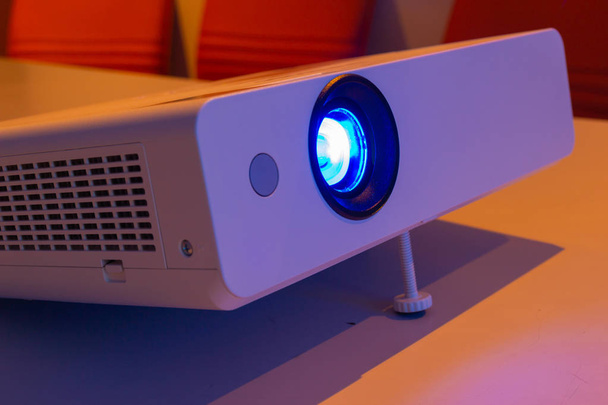 projector for presentation in a meeting room (Light in a light yellow tone room.) - Photo, Image