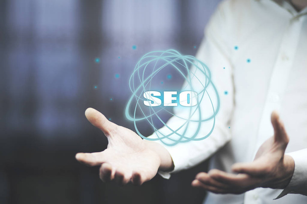 Business man with  SEO icon  - Photo, image
