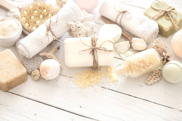 Spa composition of various objects for body care on a light wooden background, the concept of beauty and health - Photo, Image