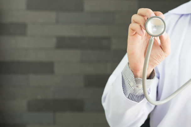 Doctor with a stethoscope in the hands - Photo, Image