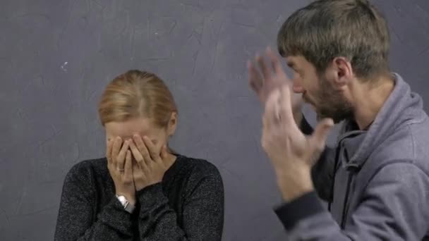 family quarrel. domestic violence. evil men shout. husband yells at his wife. girl pretends to cry. 4K - Metraje, vídeo