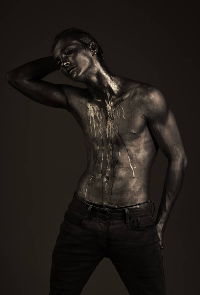 Fashion and masculinity concept. Man with nude torso - Фото, зображення