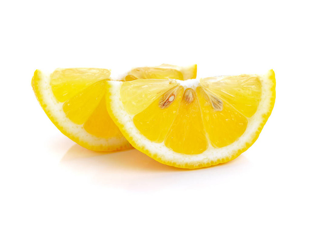Slice of lemon fruit isolated on white background - Photo, Image